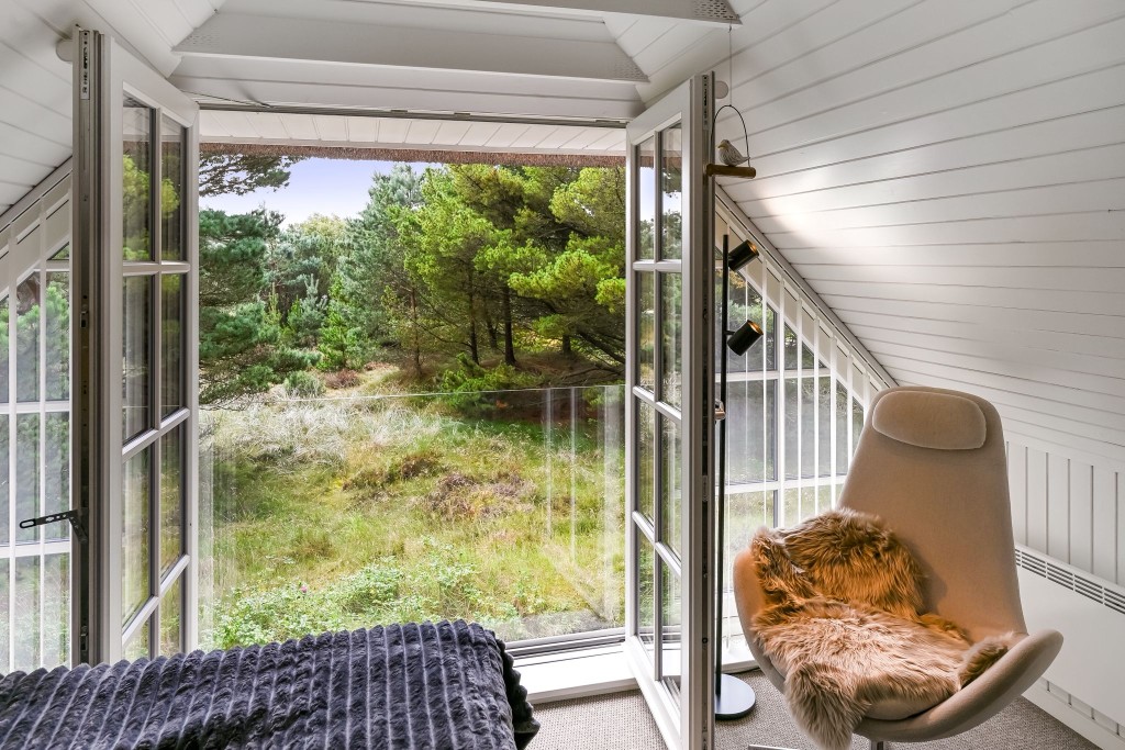 Reetdachhaus mit Pergola und Naturgrundstück